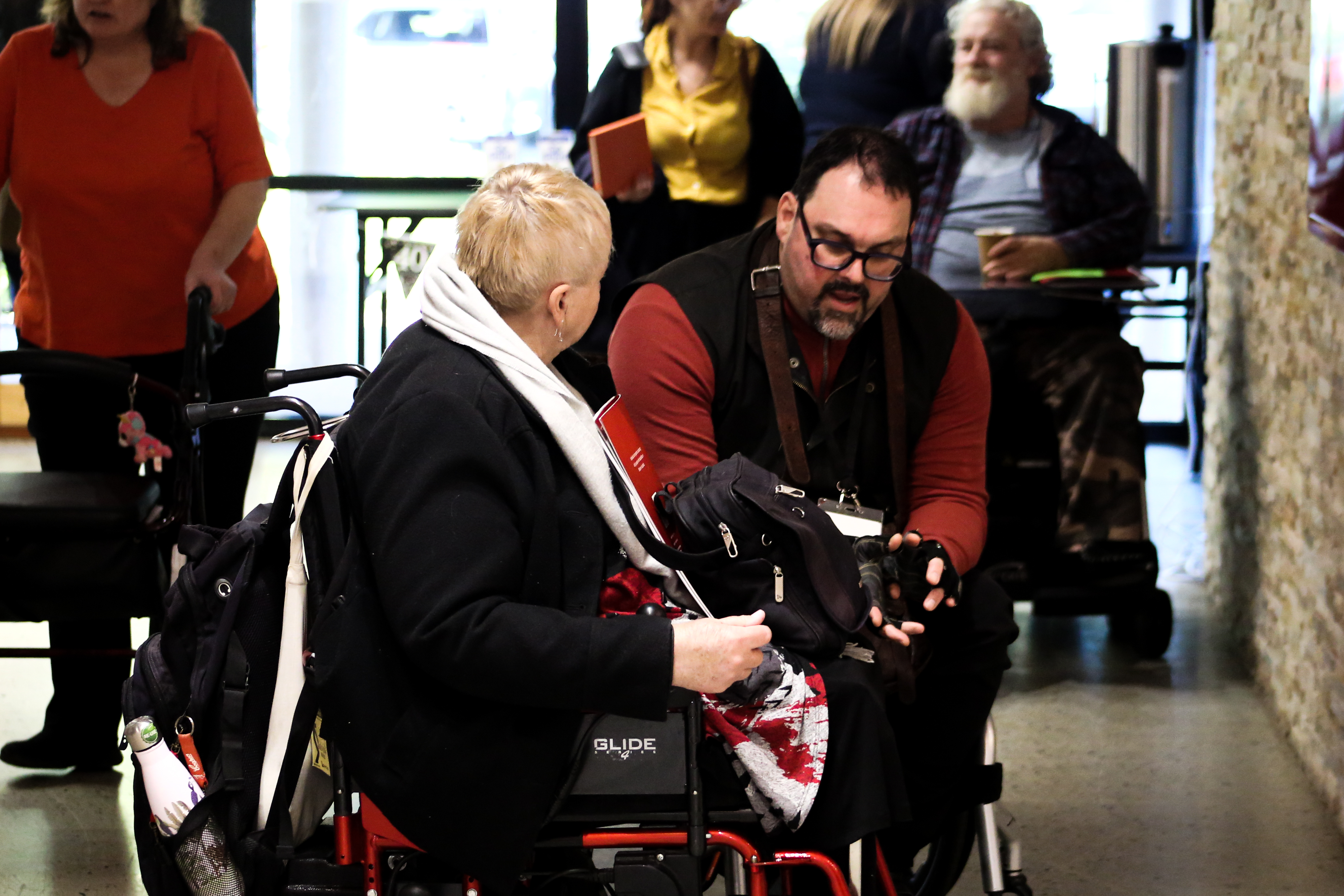 Two PWdWA members deep in conversation at a PWdWA event.