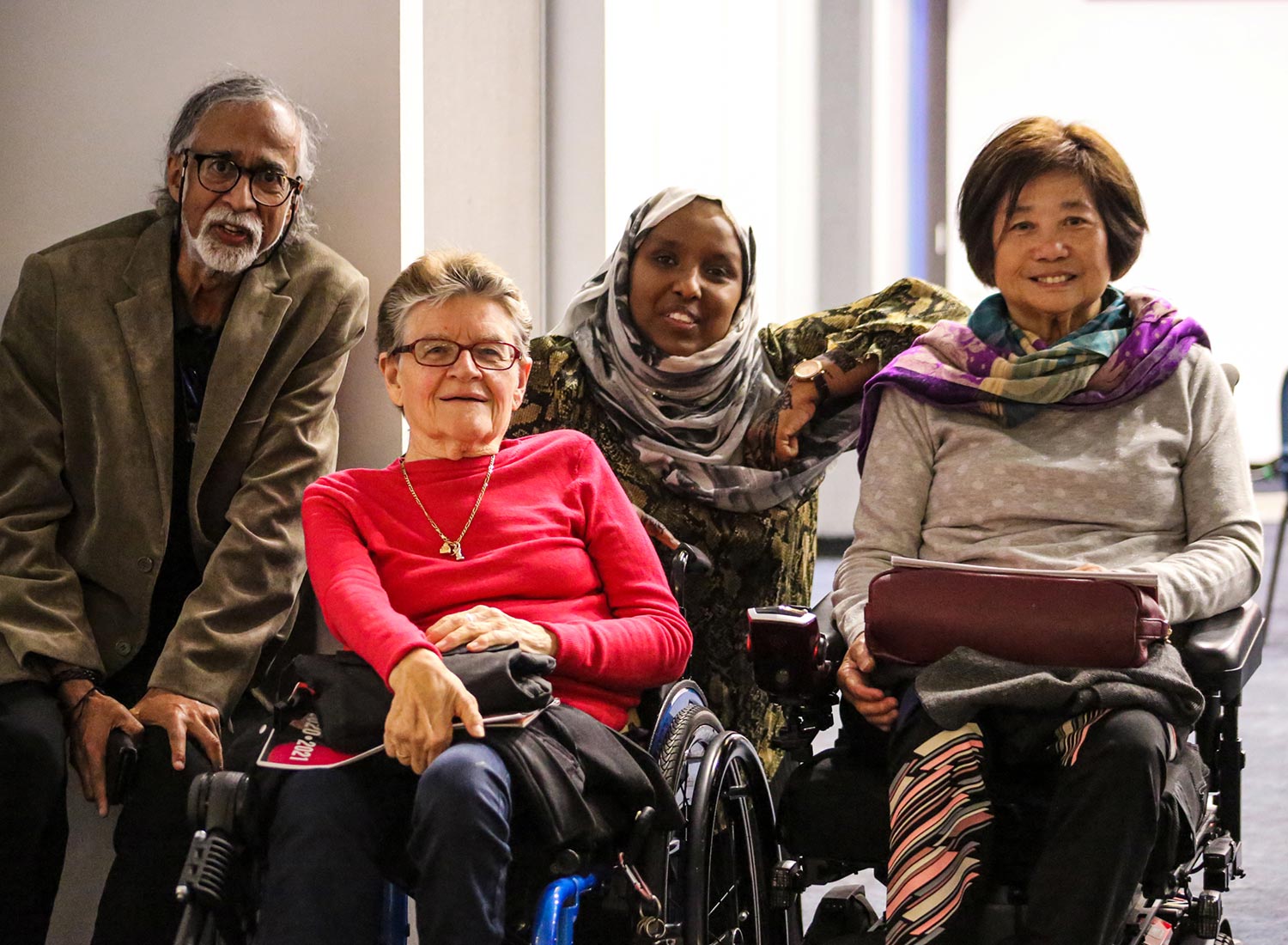 A group of PWdWA members and advocates smiling at the camera.